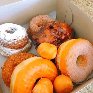 a variety of donuts in a box