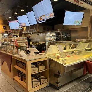 a view of the counter area of a restaurant