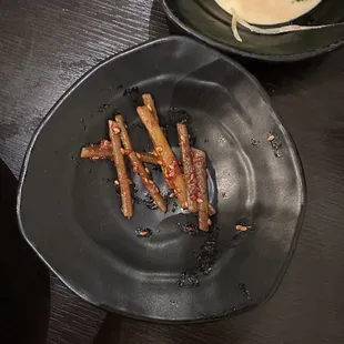 Banchan- served to eat with your meals but acts as a pieces of food that enhances your appetite