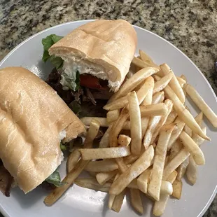 roast beef po boy! it was cooked to perfection! the fries were actually pretty good too!