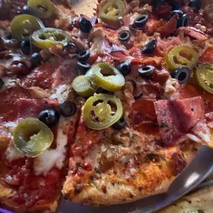 Italian Meat Lover&apos;s with added jalapeños and black olives
