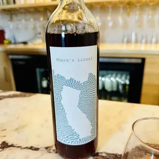a bottle and a glass