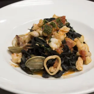 Homemade tagliatelle with squid ink