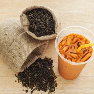 a cup of tea and a sack of loose black tea