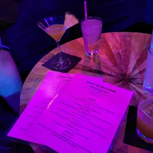 two cocktails and a menu