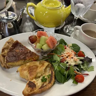 vegetable quiche trio, house salad with raspberry vinaigrette dressing, buttery grilled croissant, fruit salad &amp; Irish breakfast tea.