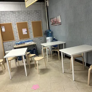 Dining in area with complimentary self service water.