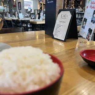 a bowl of rice on a table