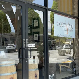 the entrance to a wine shop