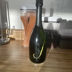 a bottle of champagne on a counter