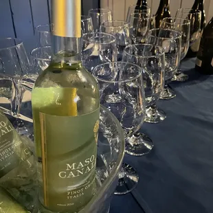 a bottle of wine and glasses