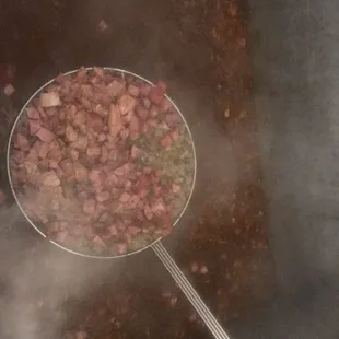 We cook Gumbo for real. Large quantities for Festival