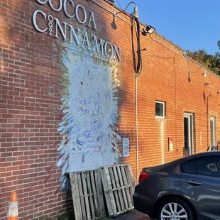 a car parked in front of a building