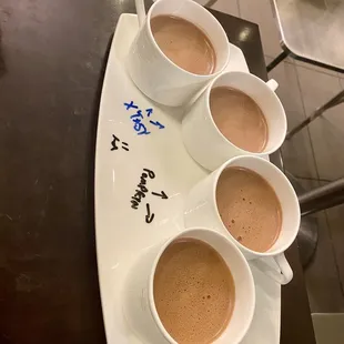 Custom &quot;flight&quot; of two flavors of hot cocoa. It&apos;s not on the menu, but they&apos;ll arrange your order this way if you ask :)