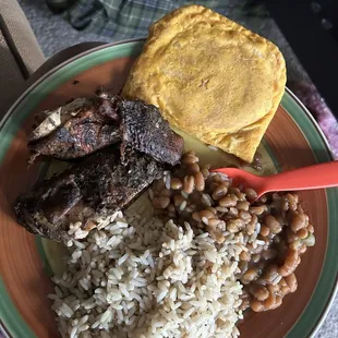Jerk Chicken seasoned rice &amp; baked beans. Beef Patty &amp; Cocoa Bread