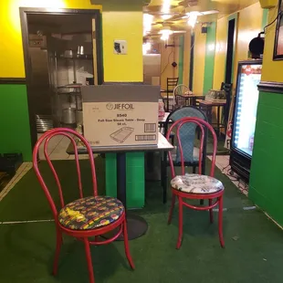 Waiting Area / Drink Machine off to the right / Table Seating in Back