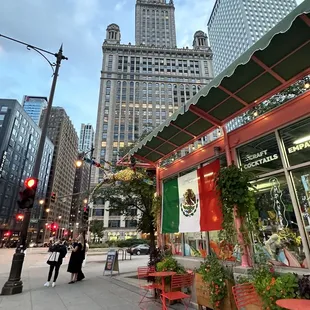 a view of a mexican restaurant on a city street