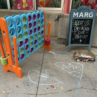 Games for the kids while you wait or while kids wait for adults to finish their meal in peace. they have corn hole/ &quot; bags&quot; too