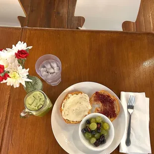 Delicious JamJam croissant with a side of fruit and honey on top. Their oat milk matcha is amazing!