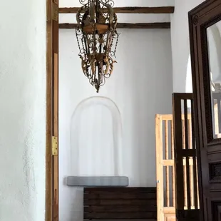 a chandelier hanging from the ceiling