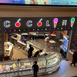 the inside of a large ice cream shop