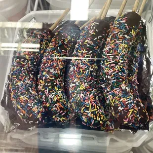 chocolate covered bananas with sprinkles
