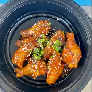 CocoWings! 1lb of Wings with our Sweet and Spicy Voodoo Sauce