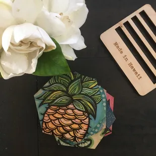 Birchwood coaster set featuring artwork by local artist Danielle Groff.
