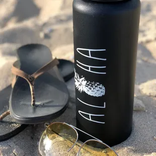 Olukai footwear and UV-printed flask.