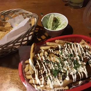 Mole fries and (already eaten) guacamole. Their chips were good!