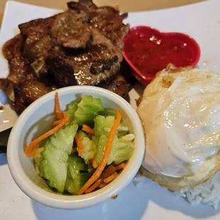 porkchop rice plate served with sweet cucumber, rice with overeasy egg, marinated porkchop and sweet sauce...$20.72 after tax and tip