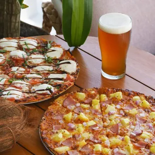 two pizzas and a beer