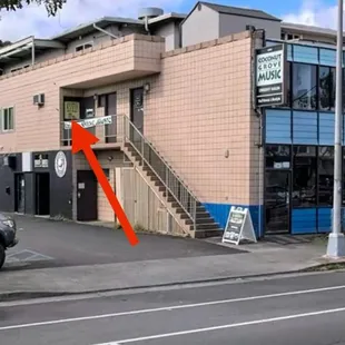 Located through the last brown door, on the second floor.