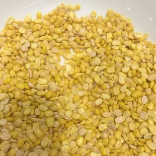 See closely, coconut hill non branded moong dal. See the white urad dal in it.