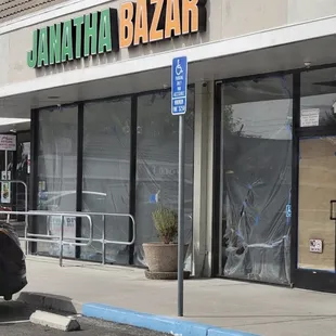 a car parked in front of the store