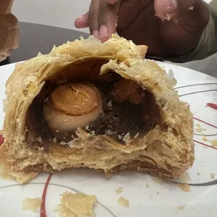 Egg Puffs we got from coconut hill groceries.  No masala  and a very small piece of egg