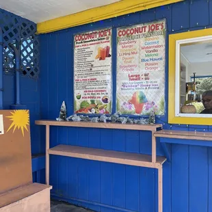 menus on a blue wall