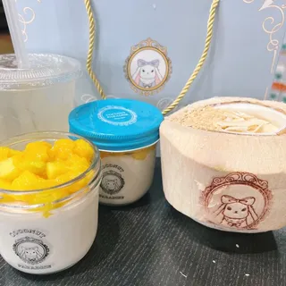 W4. Coconut Trio - Toasted Coconut. Lady Finger Cookie. Coconut Roll. Pandas Leaf