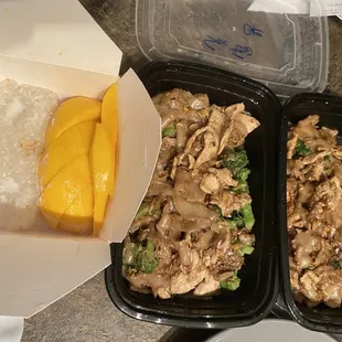 Take away order for Pad See Ew and mango sticky rice