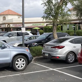 several cars parked in a parking lot