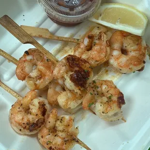 Grilled shrimp skewers to go