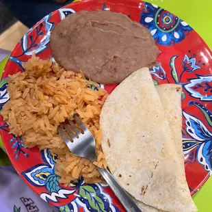 Mexican rice, beans and tortillas with cheese in the middle [wasn't in the mood for meat ;) ]