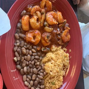 Camarones a la Diabla with rice and beans