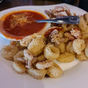 Calamari... 1/2 Price Appetizers Mon-Fri.. at Happy Hour.