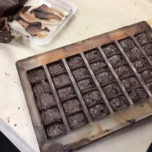 a tray of chocolates on a counter