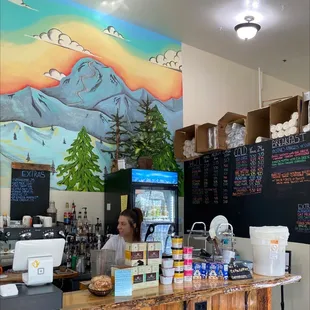 a woman behind the counter