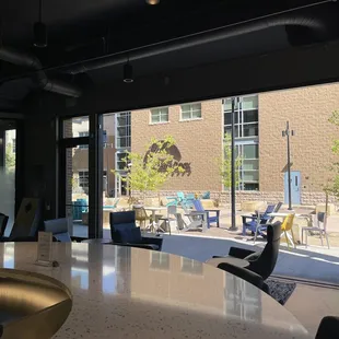 View of the open bay doors from the high counter seating area.  They have lovely padded leather chairs!