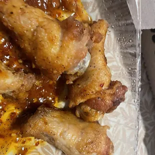 a plate of chicken wings