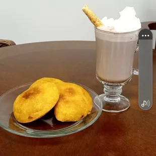 a plate of cookies and a glass of milk