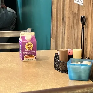 a carton of milk on a counter